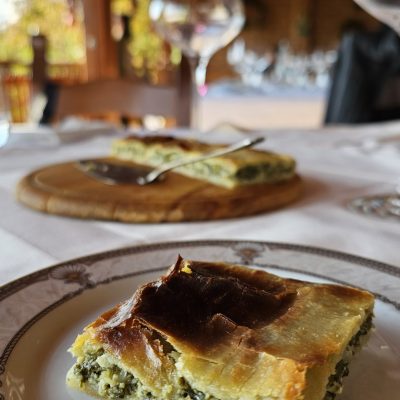 Traditional Zagreb štrukli – baked cheese pastry – served on a plate